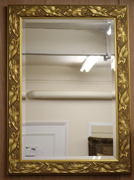 A leaf gilt wall mirror